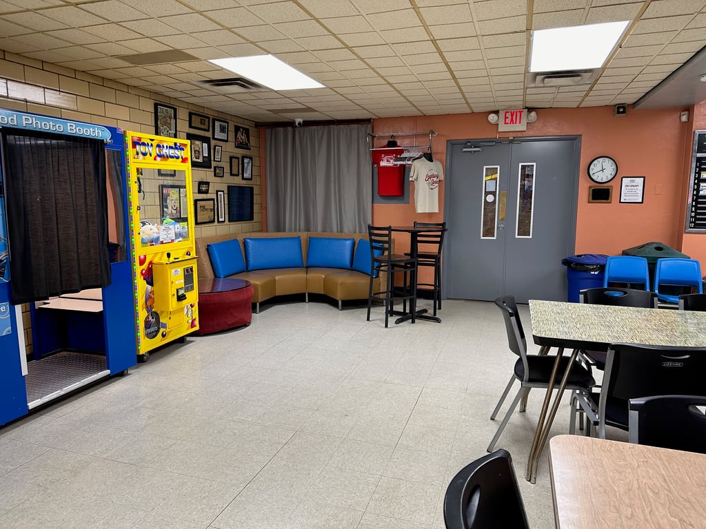 Photo of couches, game, and photo booth