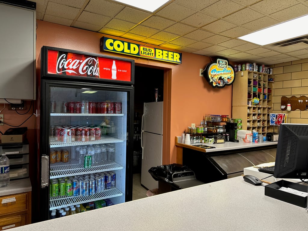 Photo of soda refrigerator and counter